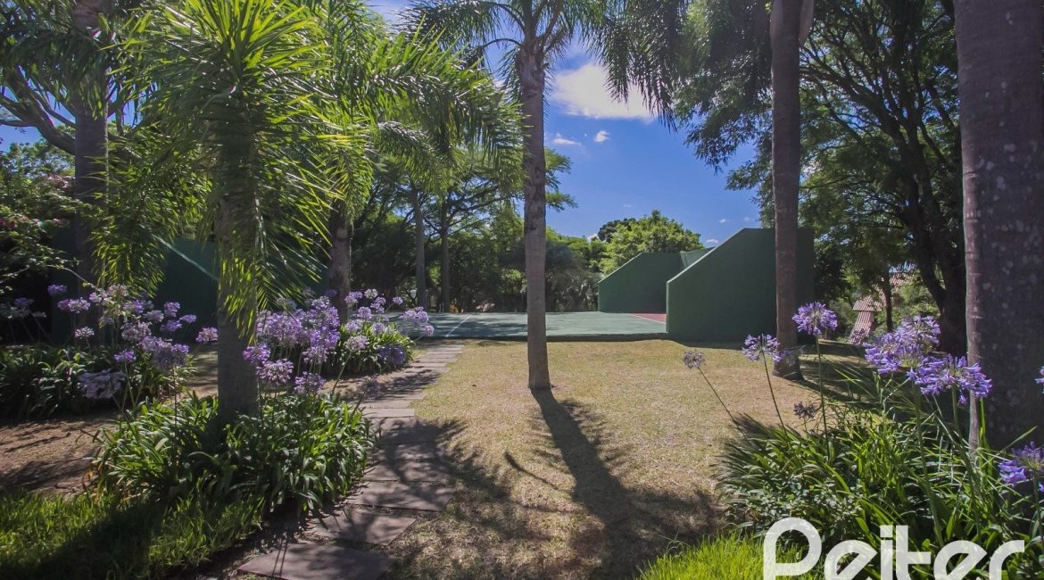 Casa em Condomínio à venda com 830m², 7 dormitórios, 3 suítes, 10 vagas, no bairro Cavalhada em PORTO ALEGRE