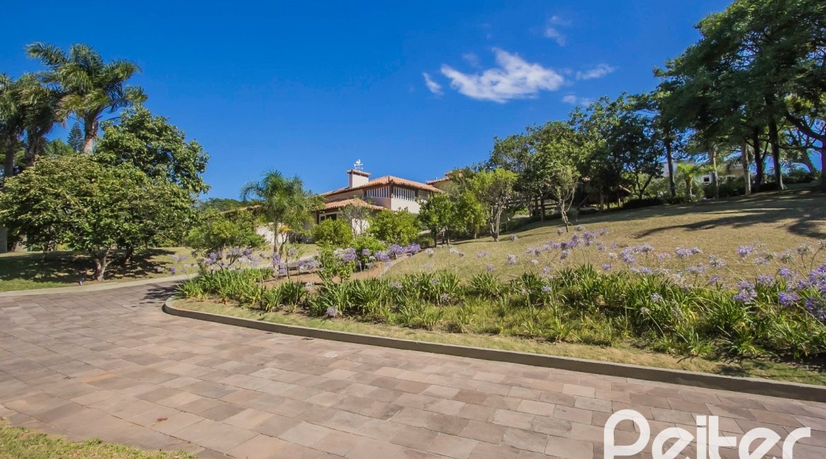 Casa em Condomínio à venda com 830m², 7 dormitórios, 3 suítes, 10 vagas, no bairro Cavalhada em PORTO ALEGRE