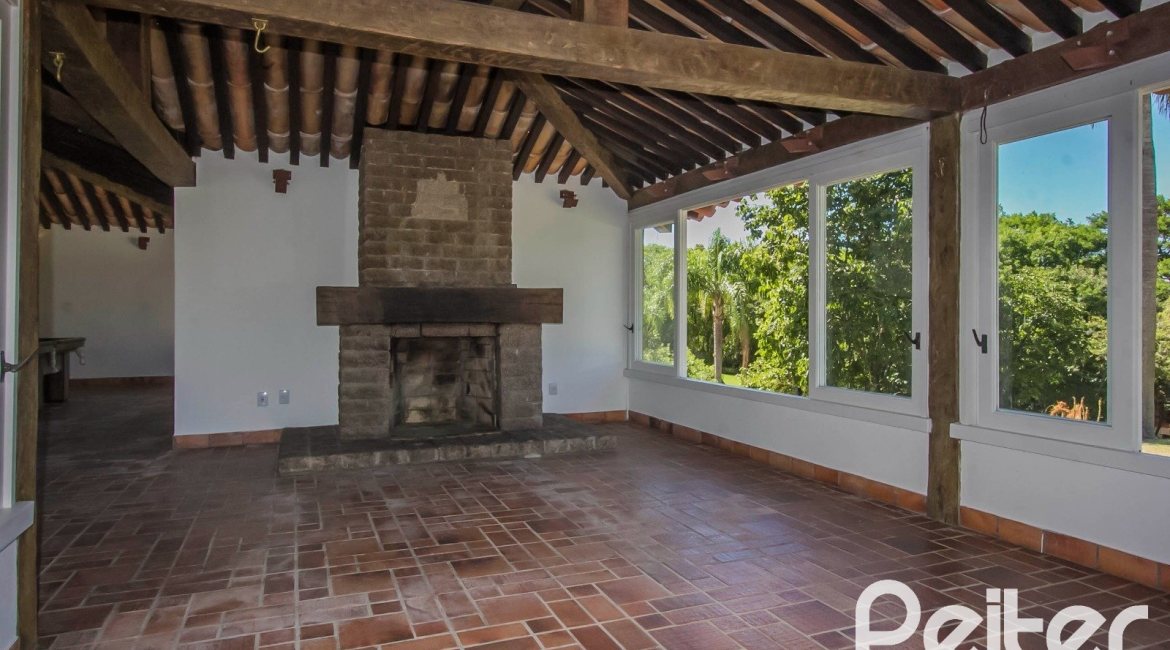 Casa em Condomínio à venda com 830m², 7 dormitórios, 3 suítes, 10 vagas, no bairro Cavalhada em PORTO ALEGRE