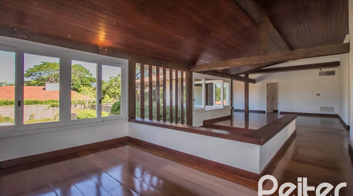 Casa em Condomínio à venda com 830m², 7 dormitórios, 3 suítes, 10 vagas, no bairro Cavalhada em PORTO ALEGRE