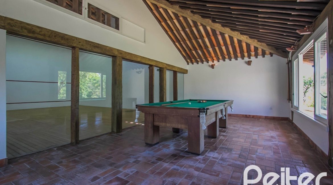 Casa em Condomínio à venda com 830m², 7 dormitórios, 3 suítes, 10 vagas, no bairro Cavalhada em PORTO ALEGRE