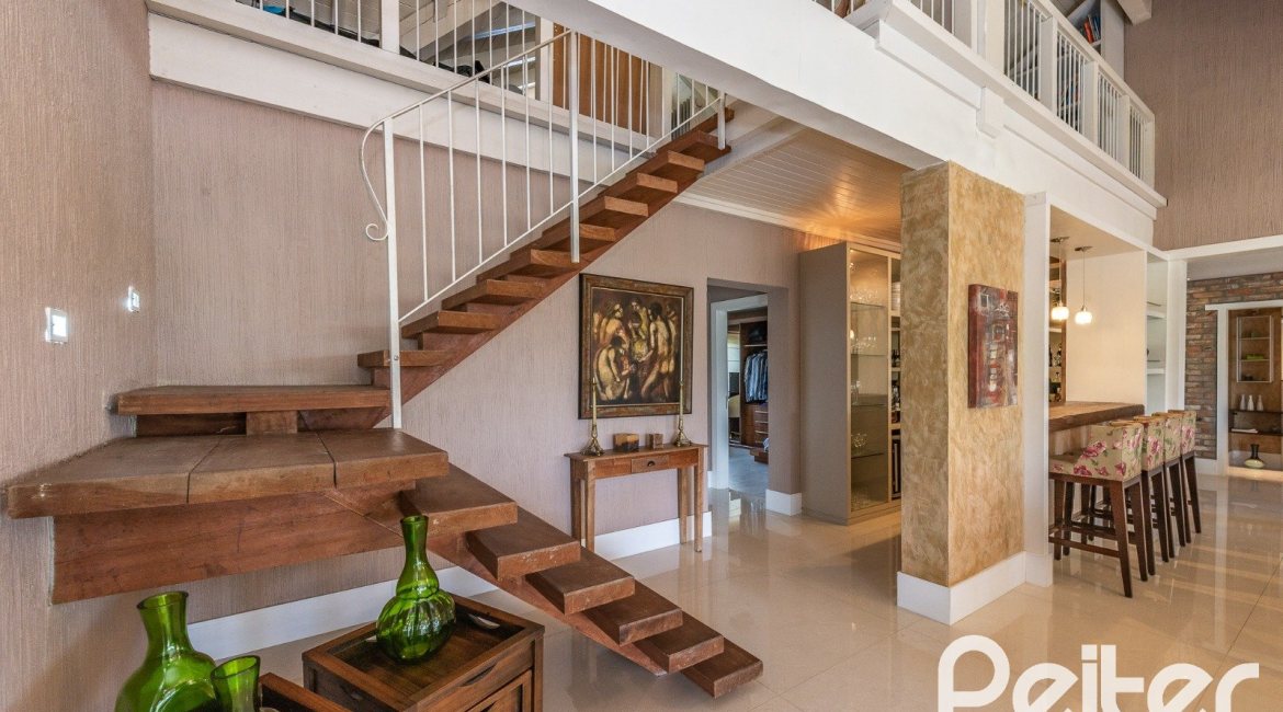 Casa em Condomínio à venda com 460m², 3 dormitórios, 3 suítes, 6 vagas, no bairro Terra Ville em PORTO ALEGRE