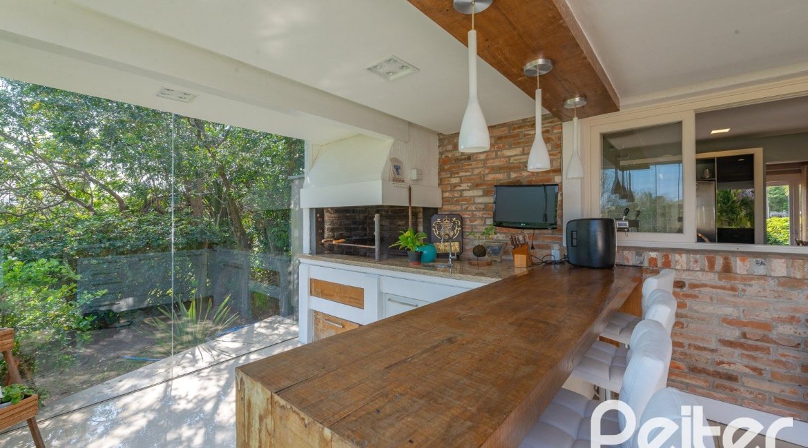 Casa em Condomínio à venda com 460m², 3 dormitórios, 3 suítes, 6 vagas, no bairro Terra Ville em PORTO ALEGRE