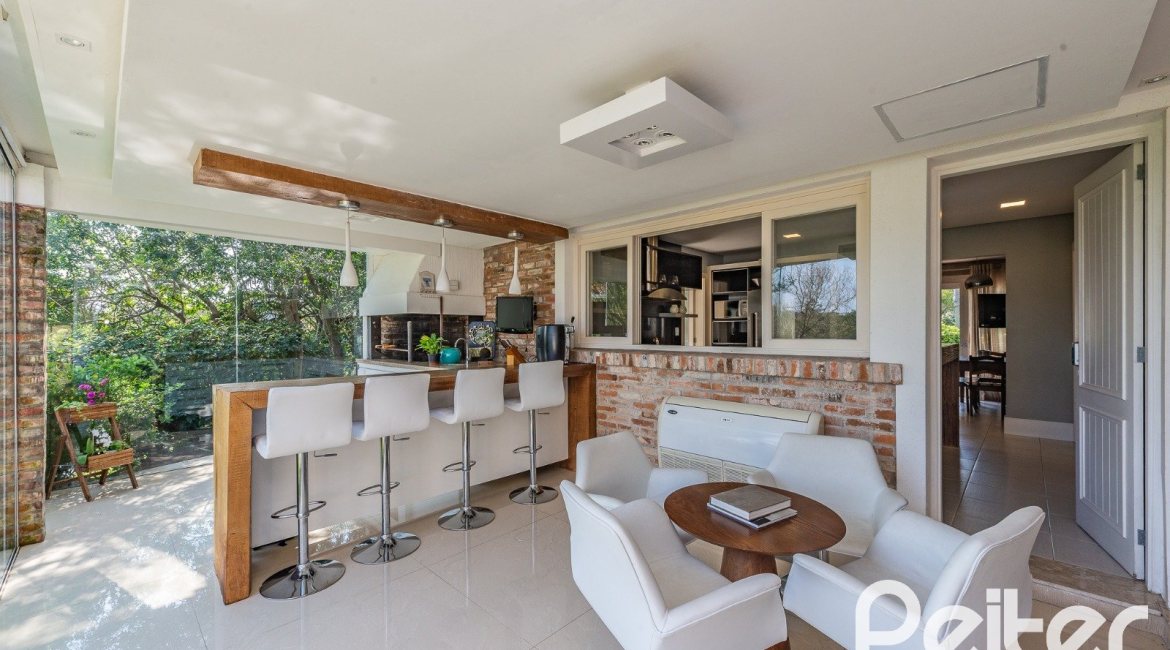 Casa em Condomínio à venda com 460m², 3 dormitórios, 3 suítes, 6 vagas, no bairro Terra Ville em PORTO ALEGRE