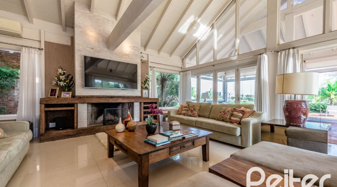 Casa em Condomínio à venda com 460m², 3 dormitórios, 3 suítes, 6 vagas, no bairro Terra Ville em PORTO ALEGRE