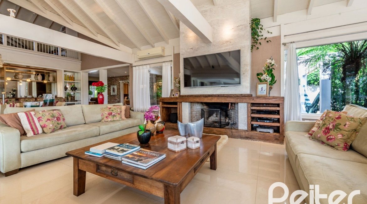 Casa em Condomínio à venda com 460m², 3 dormitórios, 3 suítes, 6 vagas, no bairro Terra Ville em PORTO ALEGRE