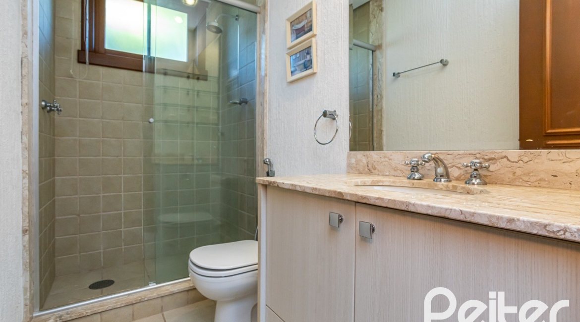 Casa em Condomínio à venda com 384m², 3 dormitórios, 3 suítes, 4 vagas, no bairro Terra Ville em PORTO ALEGRE