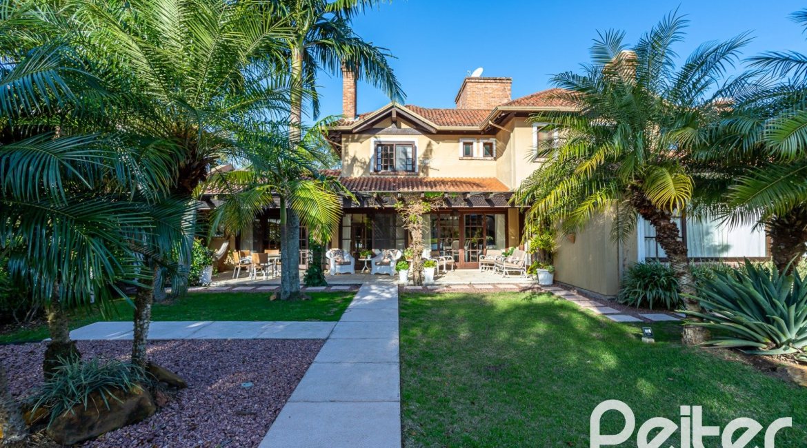 Casa em Condomínio à venda com 384m², 3 dormitórios, 3 suítes, 4 vagas, no bairro Terra Ville em PORTO ALEGRE