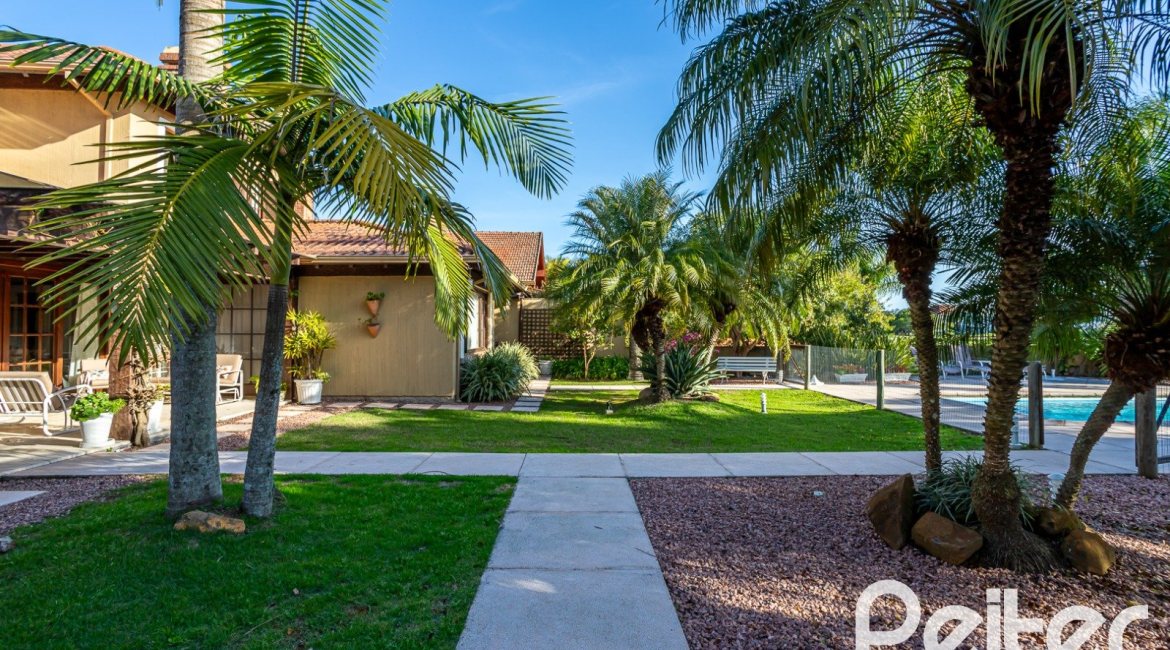 Casa em Condomínio à venda com 384m², 3 dormitórios, 3 suítes, 4 vagas, no bairro Terra Ville em PORTO ALEGRE