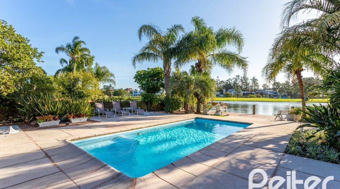 Casa em Condomínio à venda com 384m², 3 dormitórios, 3 suítes, 4 vagas, no bairro Terra Ville em PORTO ALEGRE