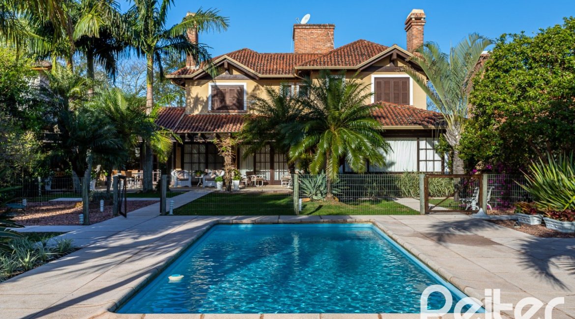 Casa em Condomínio à venda com 384m², 3 dormitórios, 3 suítes, 4 vagas, no bairro Terra Ville em PORTO ALEGRE