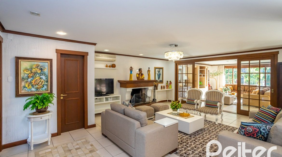 Casa em Condomínio à venda com 384m², 3 dormitórios, 3 suítes, 4 vagas, no bairro Terra Ville em PORTO ALEGRE