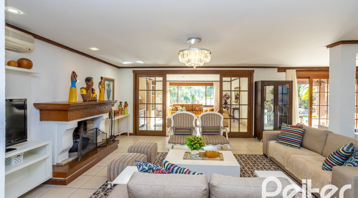 Casa em Condomínio à venda com 384m², 3 dormitórios, 3 suítes, 4 vagas, no bairro Terra Ville em PORTO ALEGRE