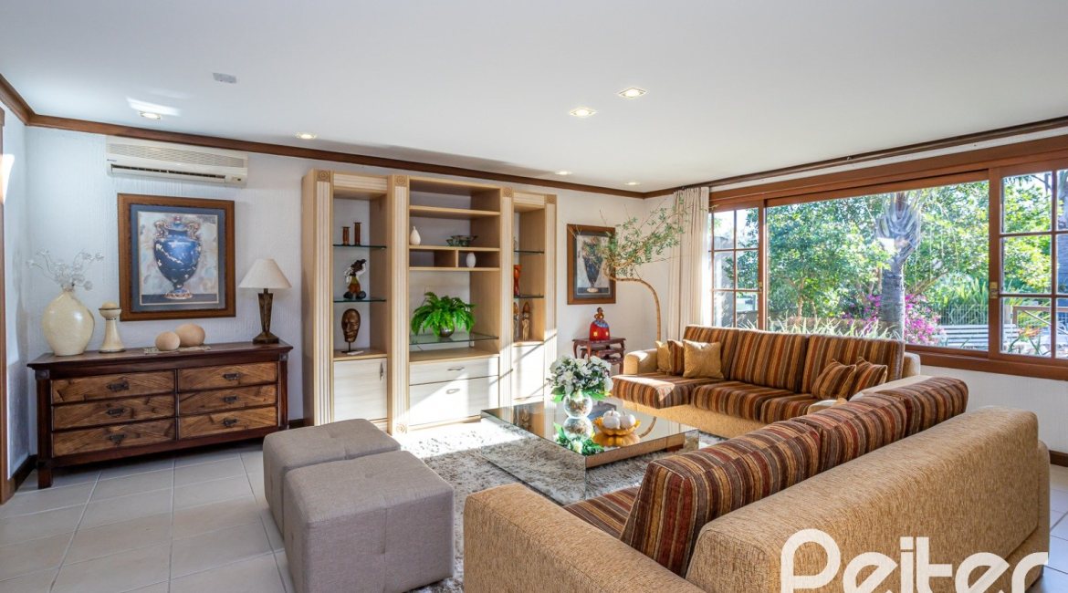 Casa em Condomínio à venda com 384m², 3 dormitórios, 3 suítes, 4 vagas, no bairro Terra Ville em PORTO ALEGRE