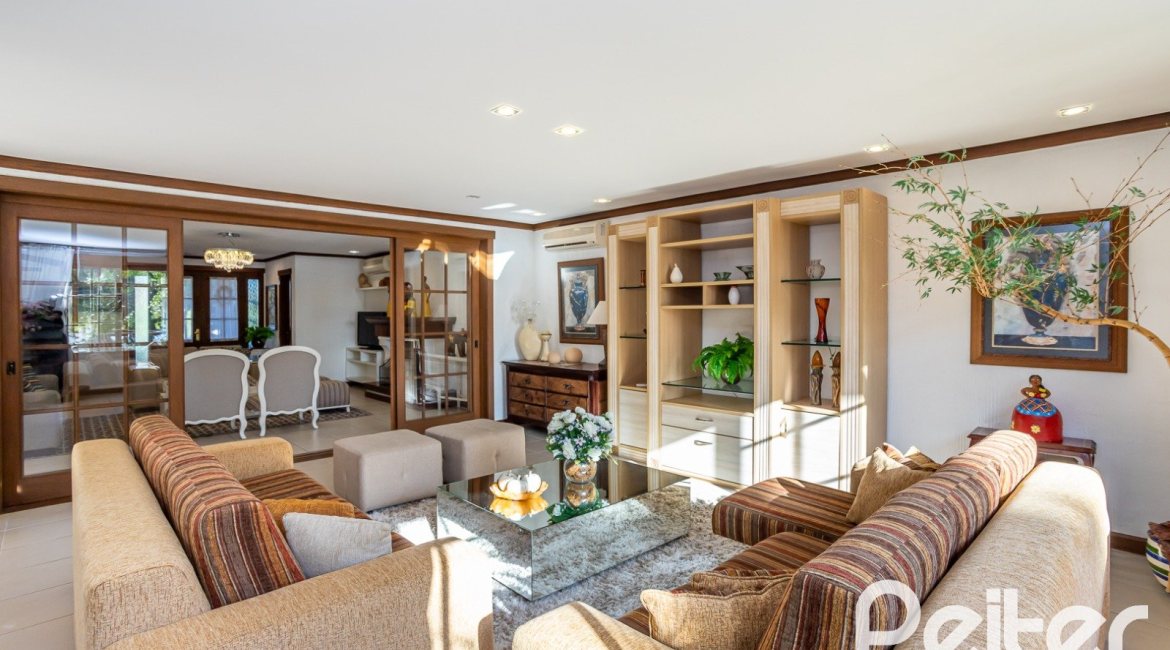 Casa em Condomínio à venda com 384m², 3 dormitórios, 3 suítes, 4 vagas, no bairro Terra Ville em PORTO ALEGRE