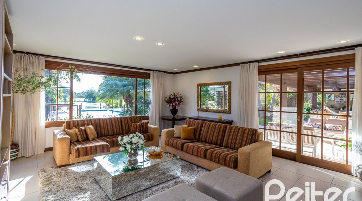 Casa em Condomínio à venda com 384m², 3 dormitórios, 3 suítes, 4 vagas, no bairro Terra Ville em PORTO ALEGRE