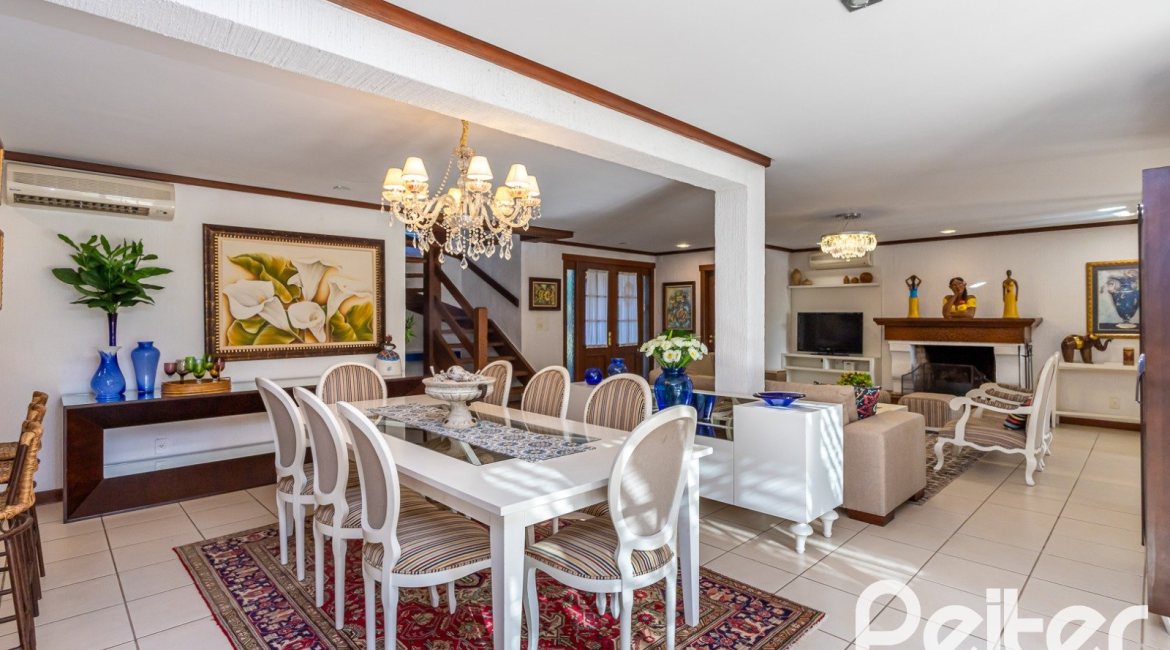 Casa em Condomínio à venda com 384m², 3 dormitórios, 3 suítes, 4 vagas, no bairro Terra Ville em PORTO ALEGRE