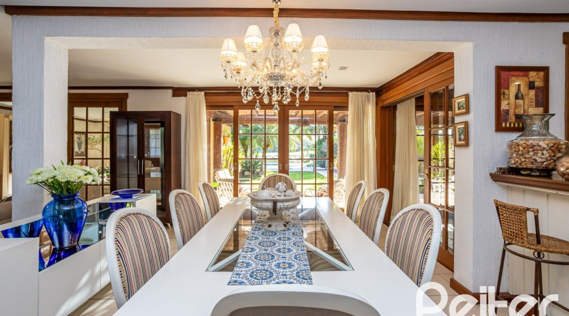 Casa em Condomínio à venda com 384m², 3 dormitórios, 3 suítes, 4 vagas, no bairro Terra Ville em PORTO ALEGRE