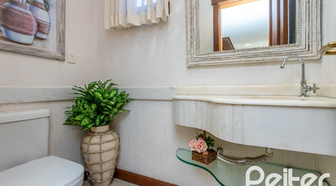 Casa em Condomínio à venda com 384m², 3 dormitórios, 3 suítes, 4 vagas, no bairro Terra Ville em PORTO ALEGRE