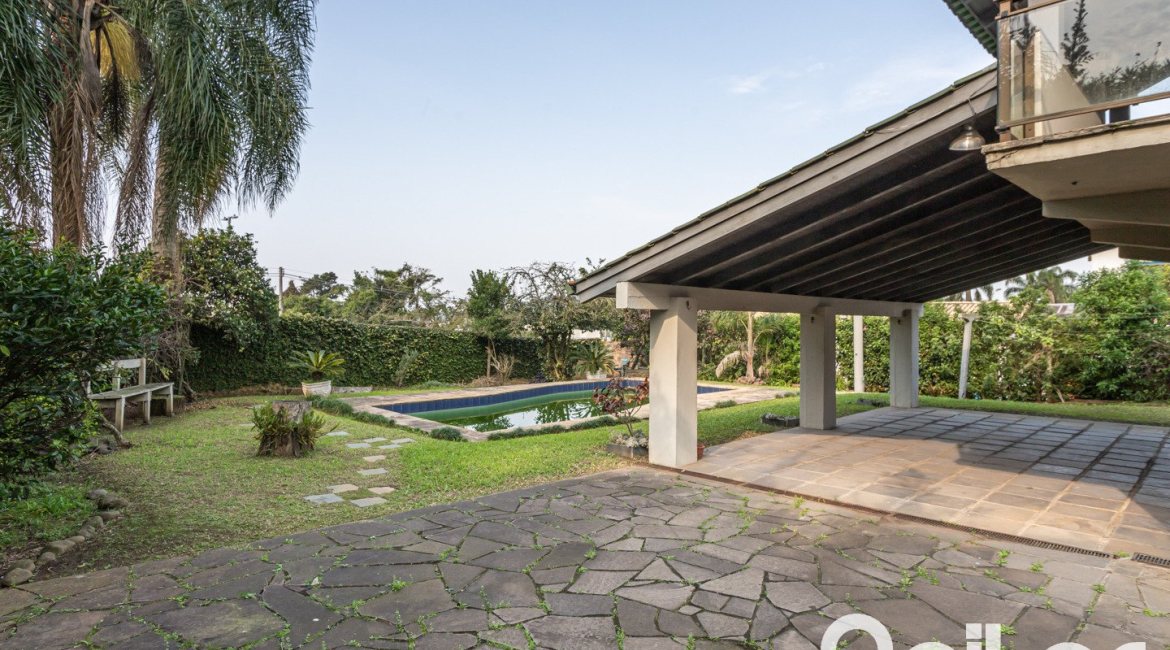 Casa em Condomínio à venda com 450m², 3 dormitórios, 1 suíte, 6 vagas, no bairro Cavalhada em PORTO ALEGRE