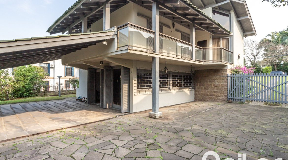 Casa em Condomínio à venda com 450m², 3 dormitórios, 1 suíte, 6 vagas, no bairro Cavalhada em PORTO ALEGRE