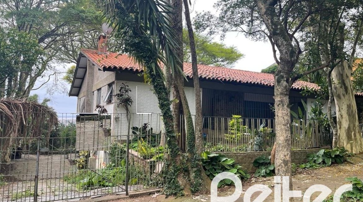Casa à venda com 397m², 4 dormitórios, 1 suíte, 4 vagas, no bairro Sétimo Céu em Porto Alegre