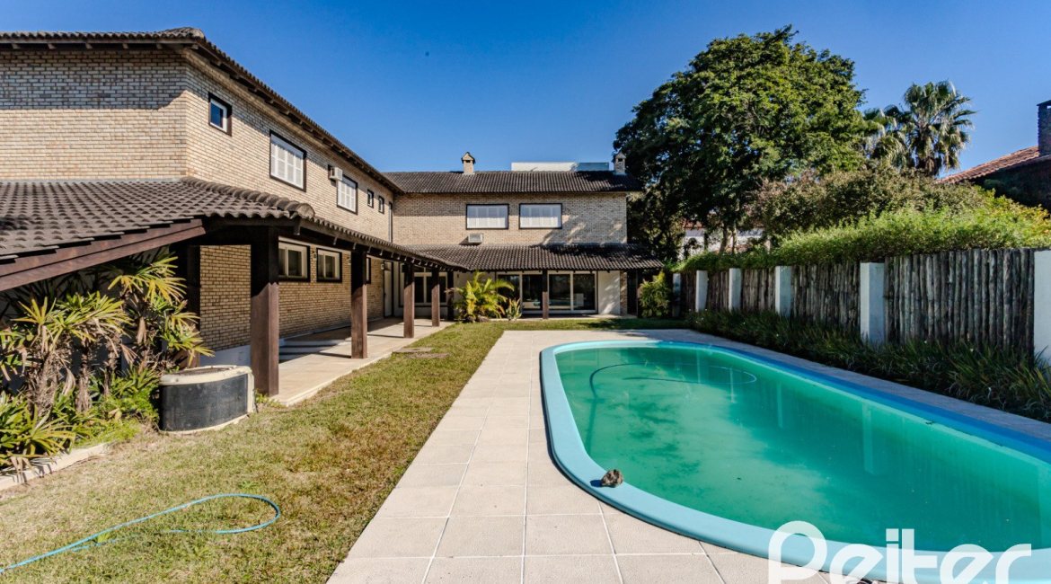 Casa em Condomínio à venda com 545m², 3 dormitórios, 3 suítes, 6 vagas, no bairro Cavalhada em PORTO ALEGRE