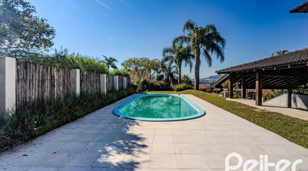 Casa em Condomínio à venda com 545m², 3 dormitórios, 3 suítes, 6 vagas, no bairro Cavalhada em PORTO ALEGRE