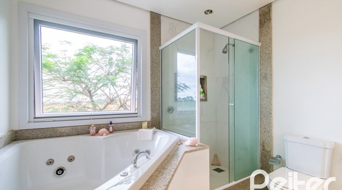 Casa em Condomínio à venda com 400m², 3 dormitórios, 1 suíte, 5 vagas, no bairro Campo Novo em Porto Alegre