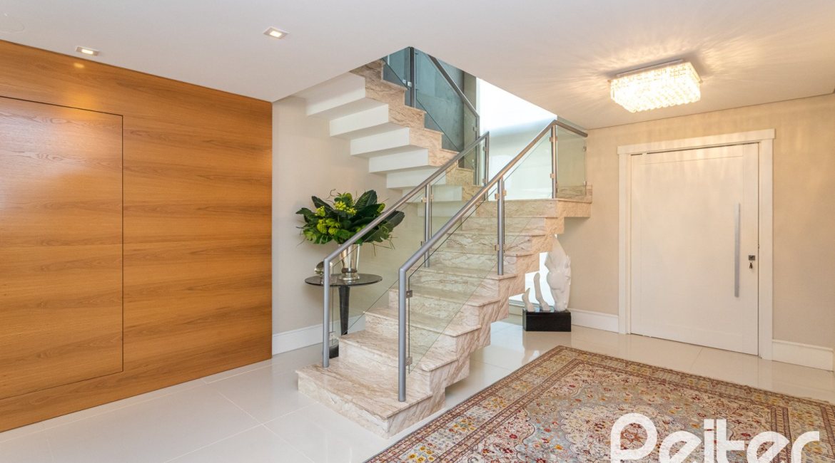 Casa em Condomínio à venda com 587m², 4 dormitórios, 4 suítes, 6 vagas, no bairro Terra Ville em PORTO ALEGRE