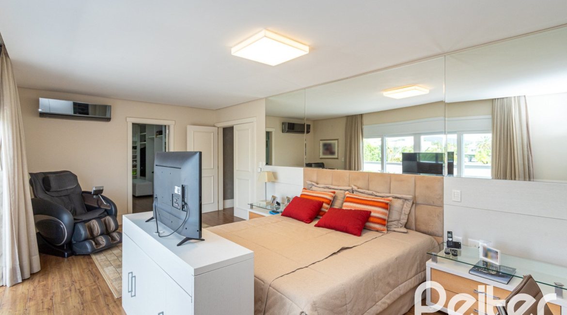 Casa em Condomínio à venda com 587m², 4 dormitórios, 4 suítes, 6 vagas, no bairro Terra Ville em PORTO ALEGRE