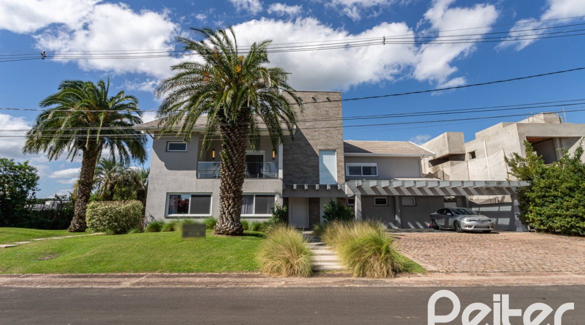 Casa em Condomínio à venda com 587m², 4 dormitórios, 4 suítes, 6 vagas, no bairro Terra Ville em PORTO ALEGRE