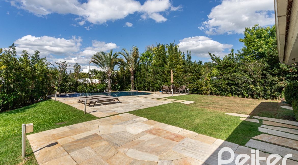 Casa em Condomínio à venda com 587m², 4 dormitórios, 4 suítes, 6 vagas, no bairro Terra Ville em PORTO ALEGRE