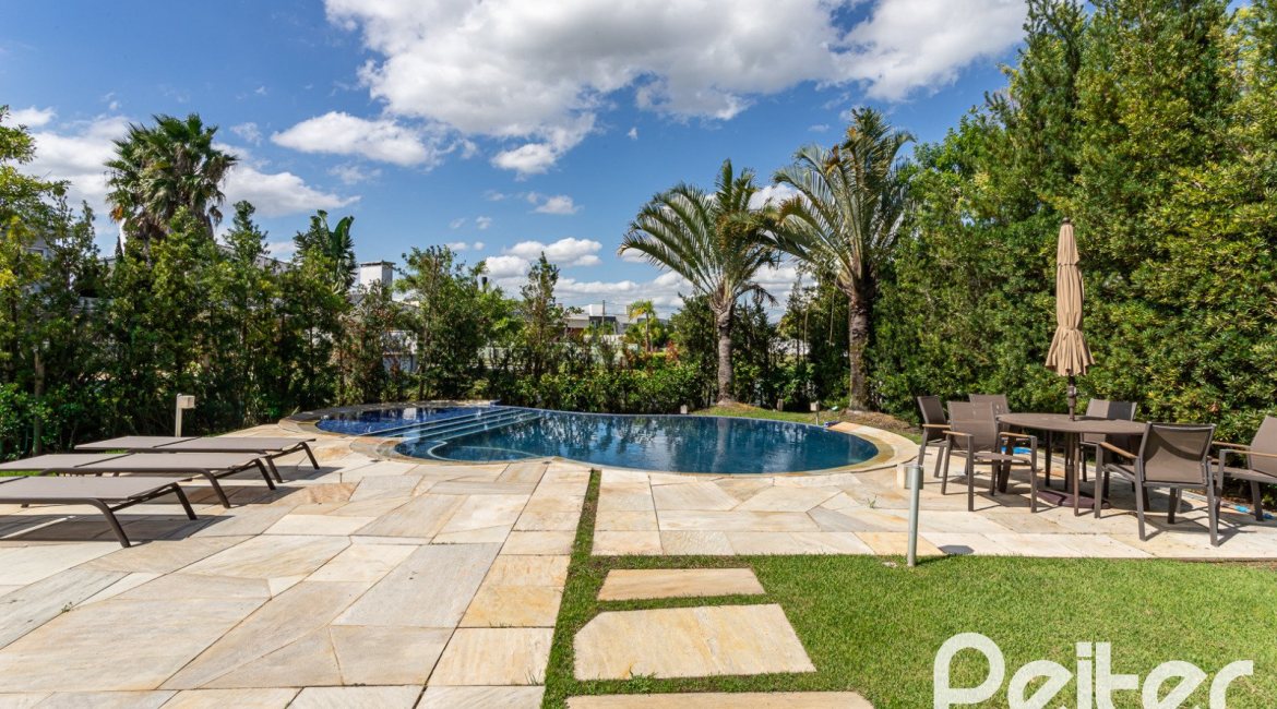 Casa em Condomínio à venda com 587m², 4 dormitórios, 4 suítes, 6 vagas, no bairro Terra Ville em PORTO ALEGRE