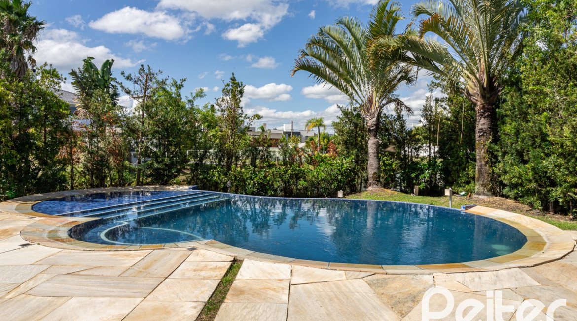Casa em Condomínio à venda com 587m², 4 dormitórios, 4 suítes, 6 vagas, no bairro Terra Ville em PORTO ALEGRE