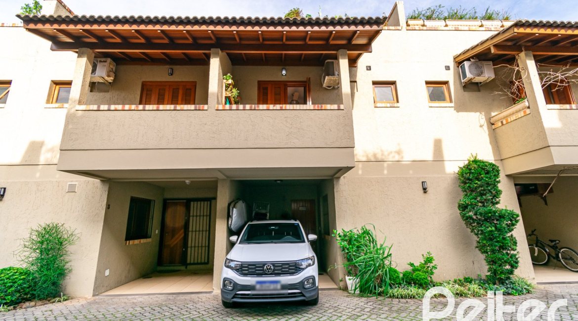 Casa em Condomínio à venda com 102m², 2 dormitórios, 1 suíte, 1 vaga, no bairro Guarujá em Porto Alegre
