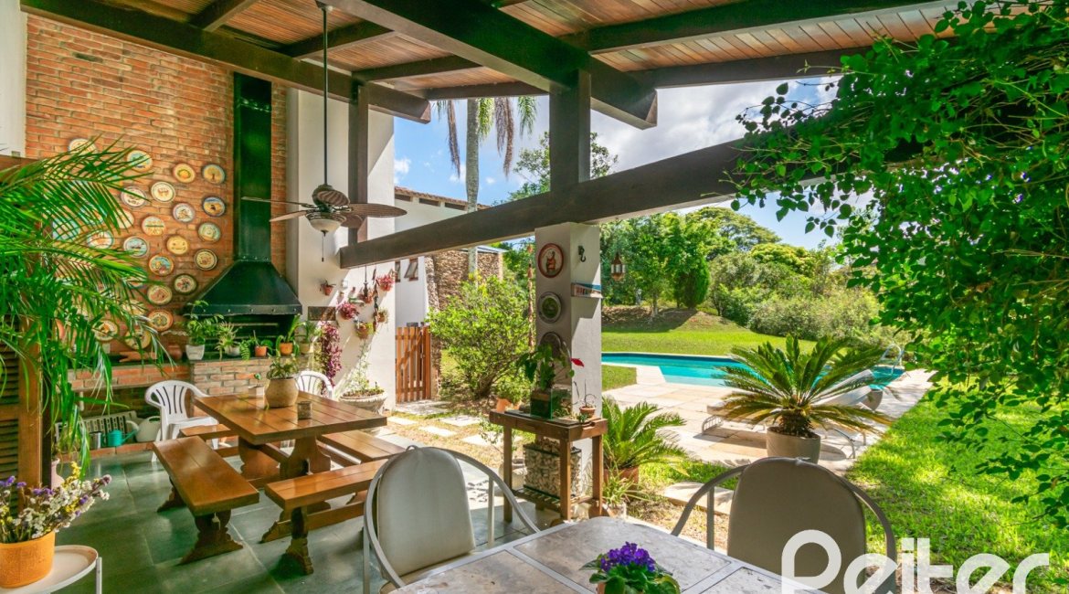 Casa em Condomínio à venda com 388m², 3 dormitórios, 2 suítes, 6 vagas, no bairro Cavalhada em PORTO ALEGRE