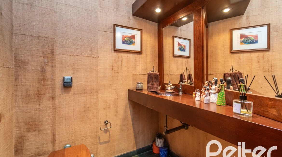 Casa em Condomínio à venda com 388m², 3 dormitórios, 2 suítes, 6 vagas, no bairro Cavalhada em PORTO ALEGRE