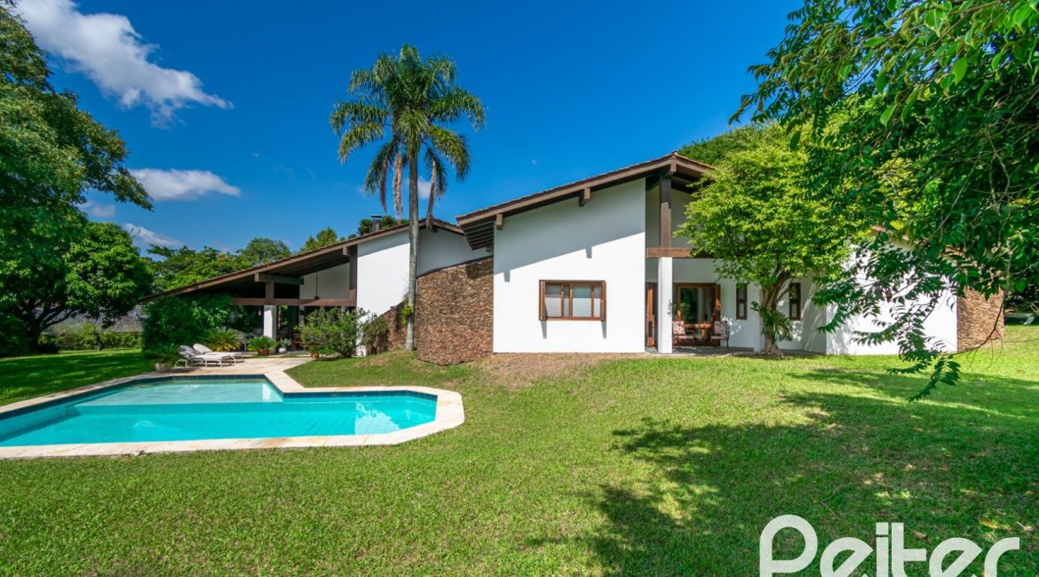 Casa em Condomínio à venda com 388m², 3 dormitórios, 2 suítes, 6 vagas, no bairro Cavalhada em PORTO ALEGRE