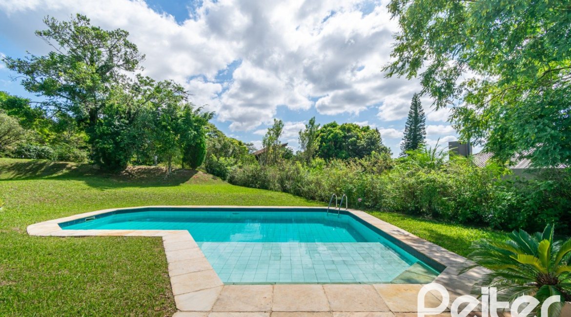 Casa em Condomínio à venda com 388m², 3 dormitórios, 2 suítes, 6 vagas, no bairro Cavalhada em PORTO ALEGRE