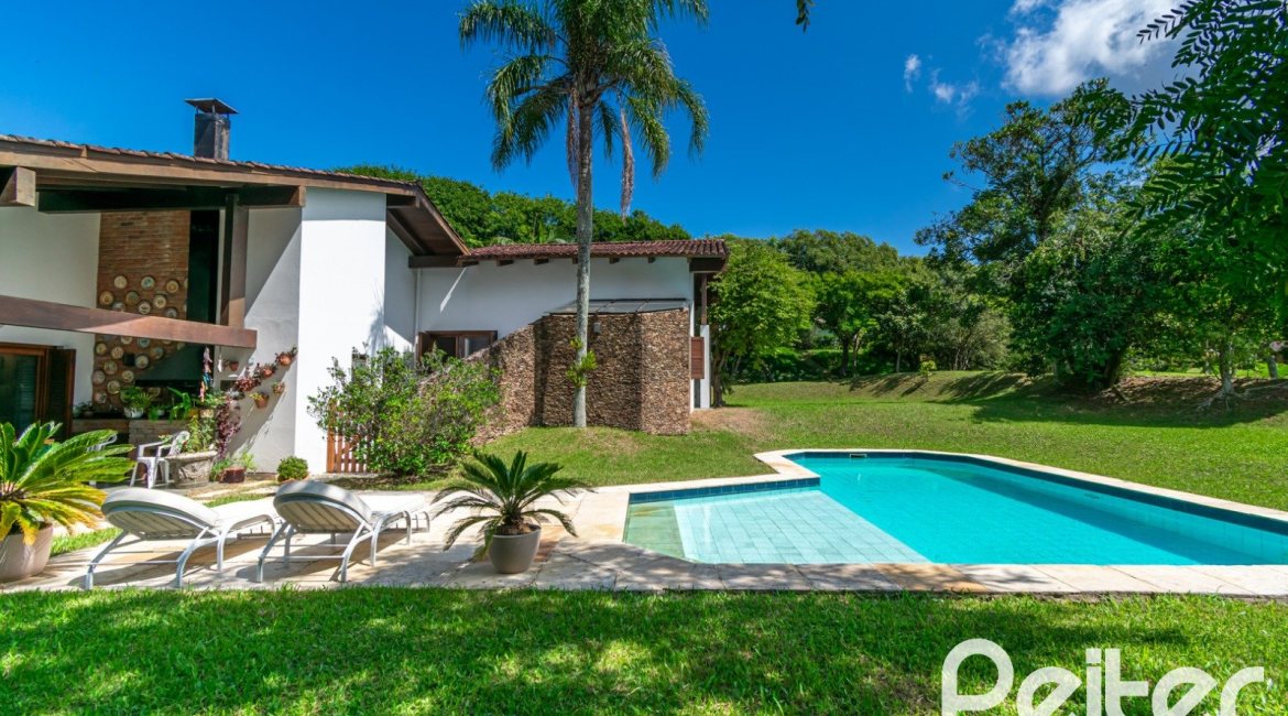 Casa em Condomínio à venda com 388m², 3 dormitórios, 2 suítes, 6 vagas, no bairro Cavalhada em PORTO ALEGRE