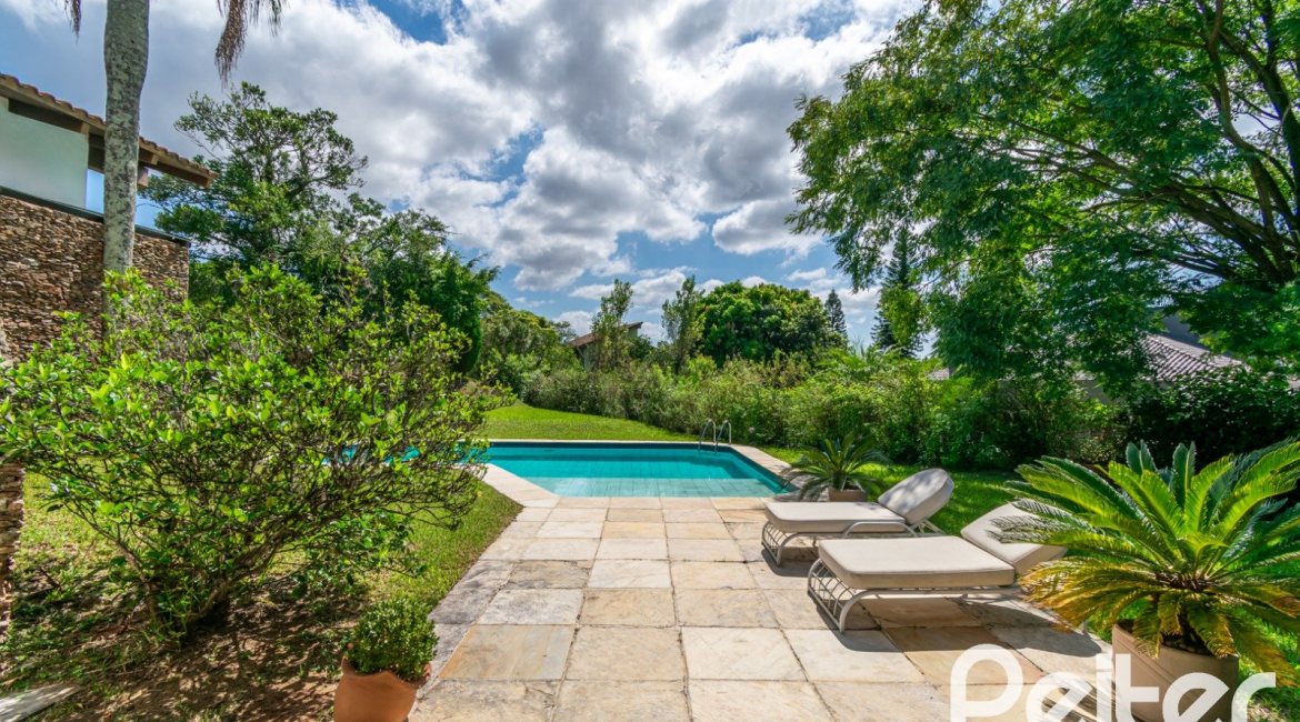 Casa em Condomínio à venda com 388m², 3 dormitórios, 2 suítes, 6 vagas, no bairro Cavalhada em PORTO ALEGRE