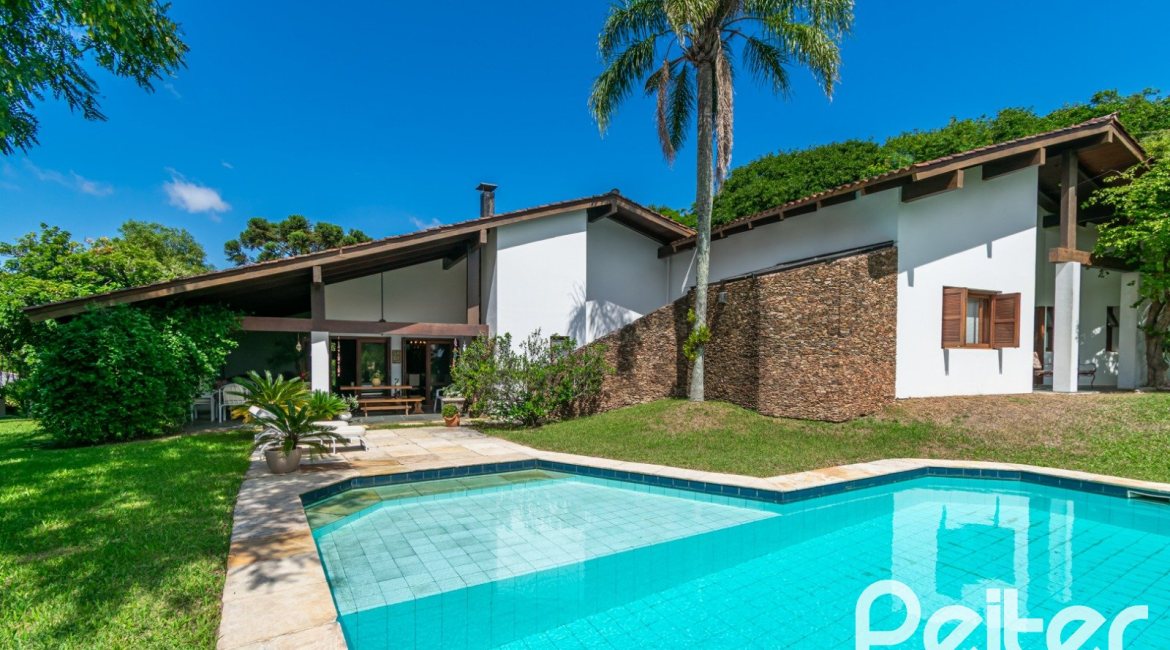 Casa em Condomínio à venda com 388m², 3 dormitórios, 2 suítes, 6 vagas, no bairro Cavalhada em PORTO ALEGRE