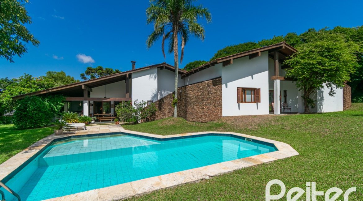 Casa em Condomínio à venda com 388m², 3 dormitórios, 2 suítes, 6 vagas, no bairro Cavalhada em PORTO ALEGRE