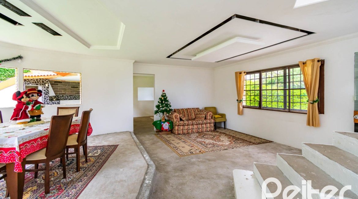 Casa em Condomínio à venda com 390m², 4 dormitórios, 3 suítes, 9 vagas, no bairro Nonoai em Porto Alegre