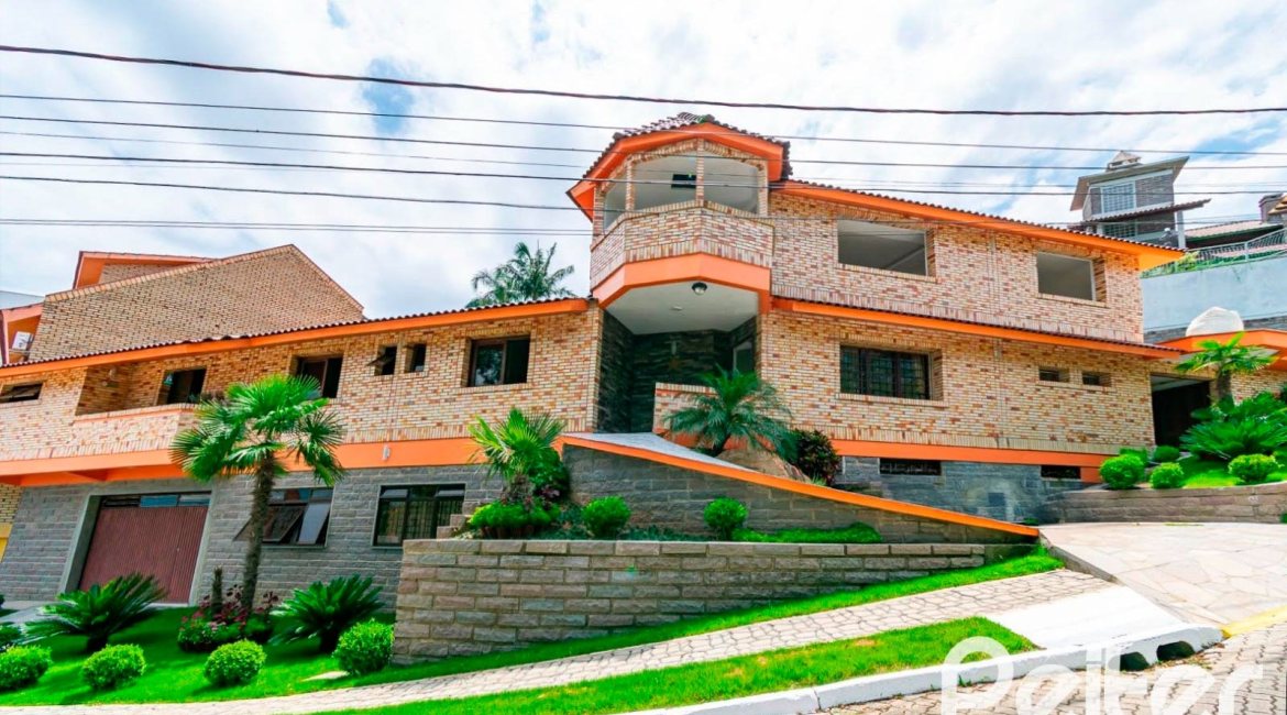 Casa em Condomínio à venda com 390m², 4 dormitórios, 3 suítes, 9 vagas, no bairro Nonoai em Porto Alegre