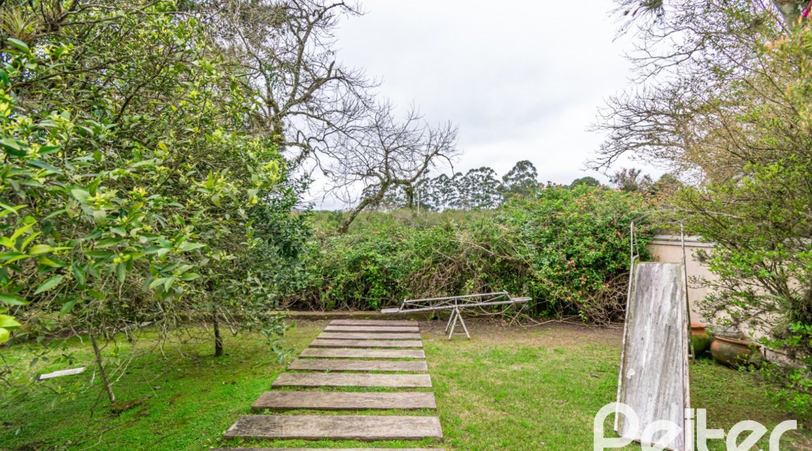 Casa em Condomínio à venda com 229m², 4 dormitórios, 1 suíte, 4 vagas, no bairro Terra Ville em PORTO ALEGRE
