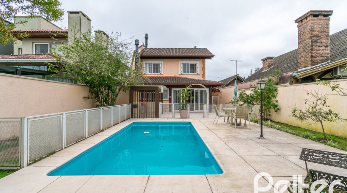Casa em Condomínio à venda com 229m², 4 dormitórios, 1 suíte, 4 vagas, no bairro Terra Ville em PORTO ALEGRE