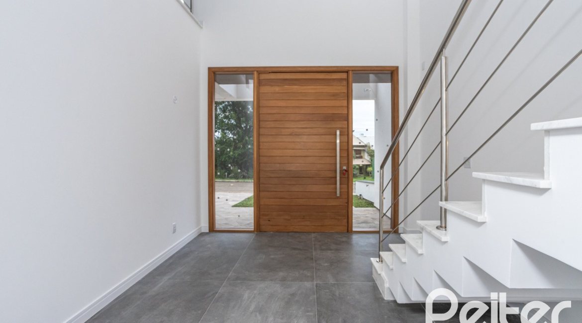 Casa em Condomínio à venda com 256m², 3 dormitórios, 3 suítes, 2 vagas, no bairro Hipica em PORTO ALEGRE