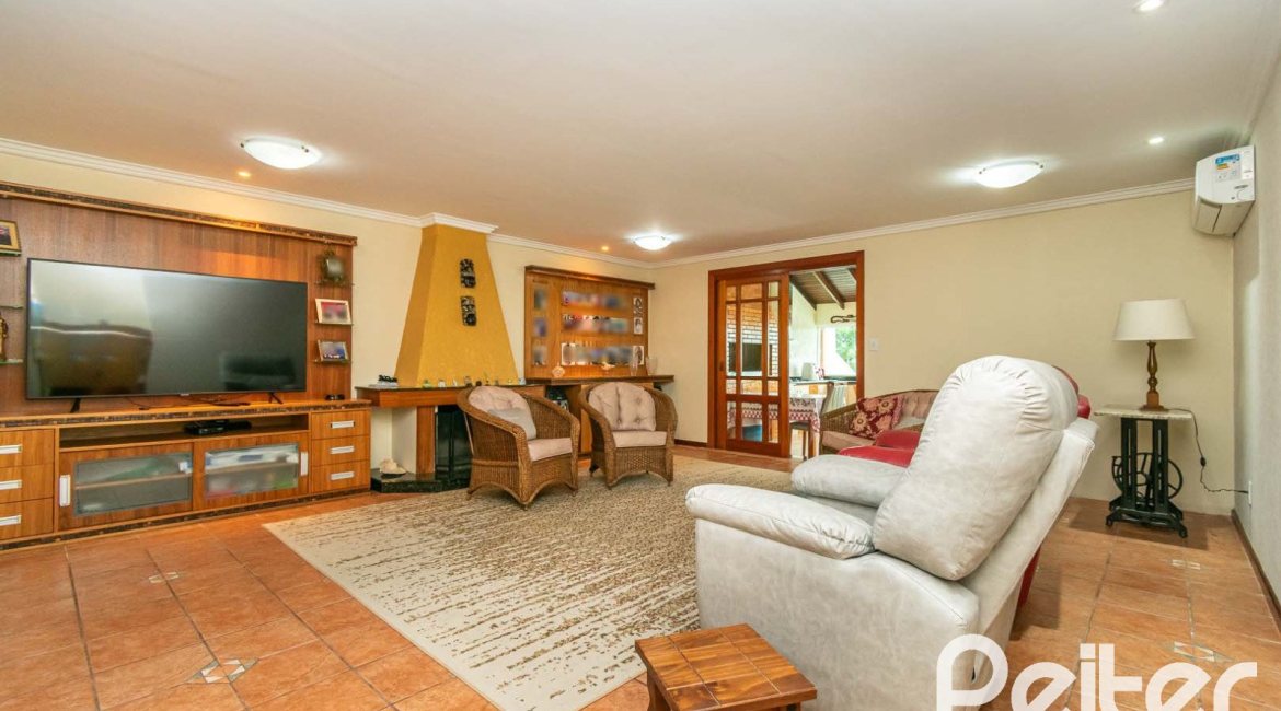 Casa em Condomínio à venda com 477m², 3 dormitórios, 1 suíte, 3 vagas, no bairro Nonoai em Porto Alegre